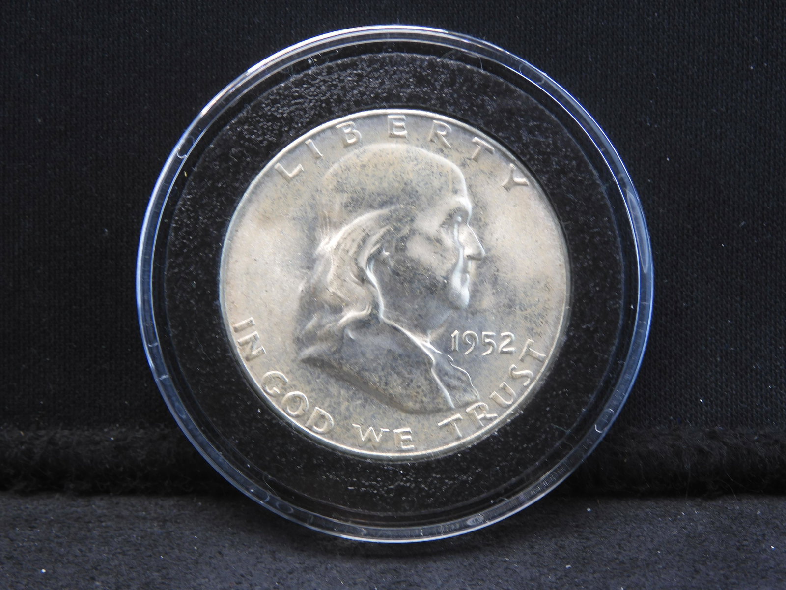 1952-S Franklin Half. Very choice BU with sharp full bell lines. In capsule from old complete: 1952-S Franklin Half. Very choice BU with sharp full bell lines. In capsule from old complete set.
