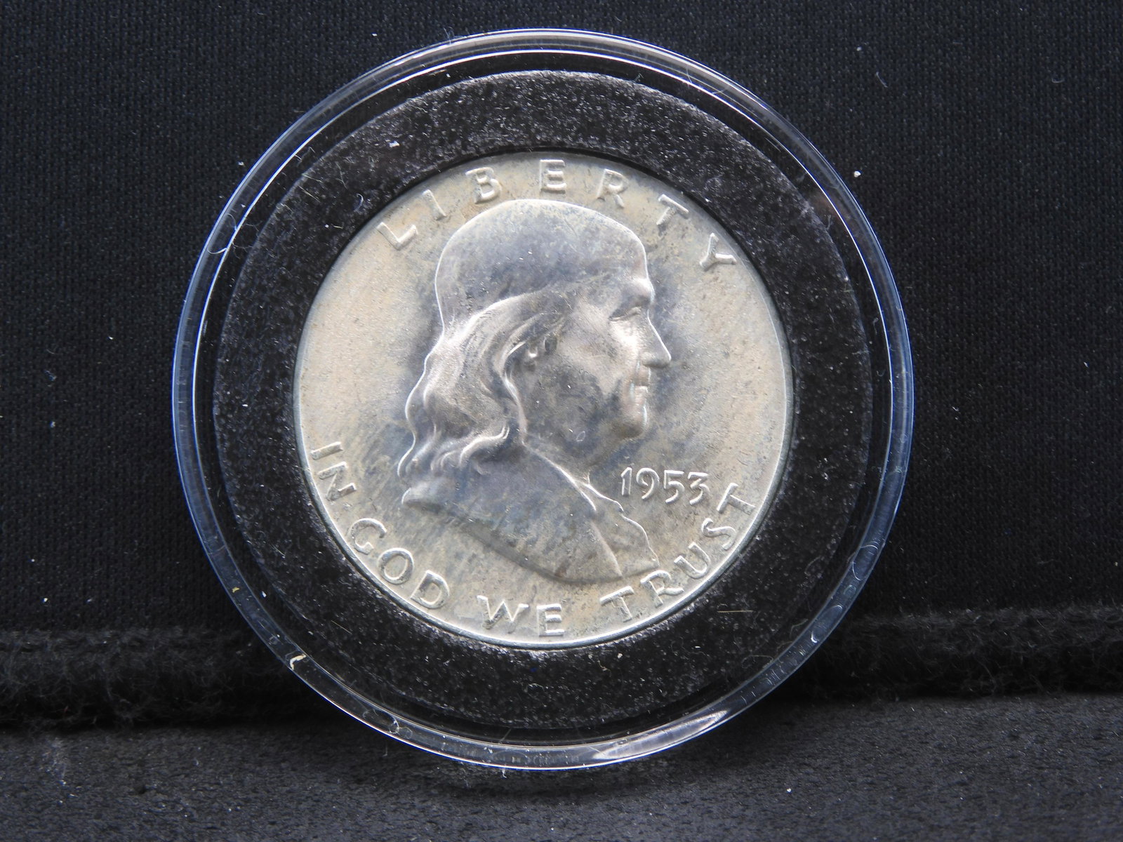 1953-D Franklin Half. Very choice BU with sharp full bell lines. In capsule from old complete: 1953-D Franklin Half. Very choice BU with sharp full bell lines. In capsule from old complete set.