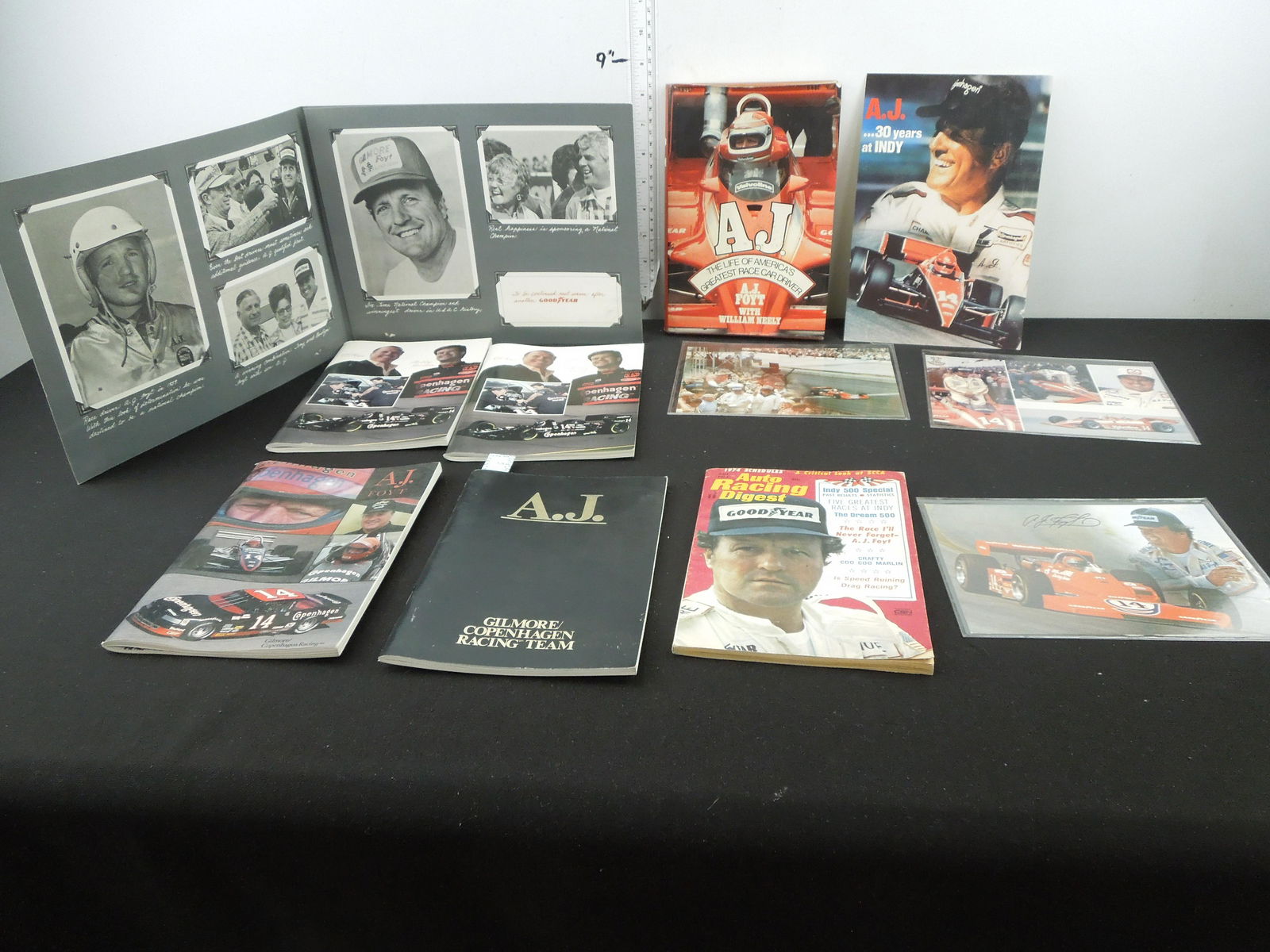 Lot of AJ Foyt Items; 1987, 1989, & 1993 Media Guides, Oversized Postcards, 30 Years at Indy Hero (1 of 9)