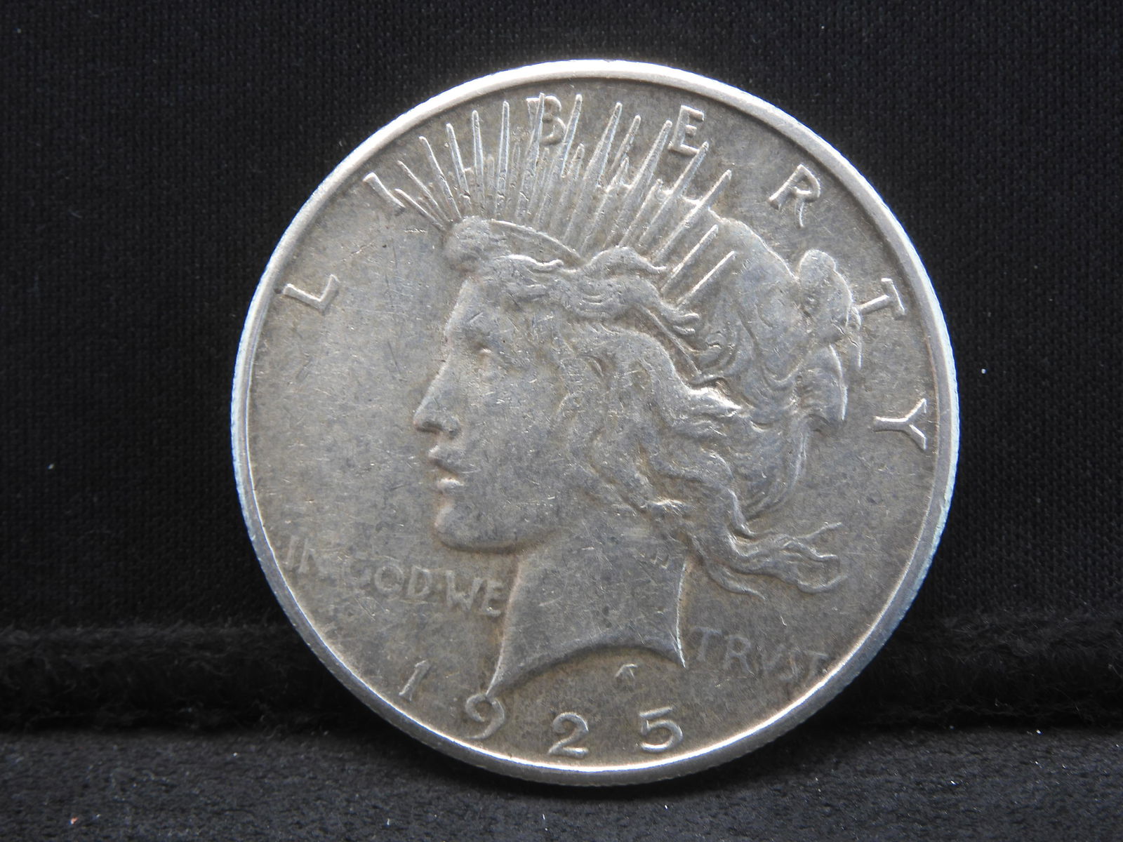 1925-S Peace Dollar.  Almost Uncirculated.  Better date. (1 of 3)