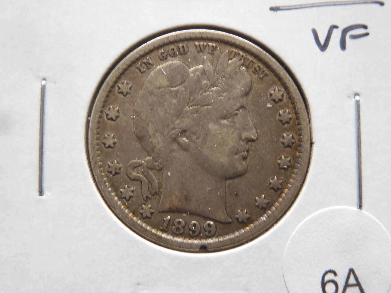 1899 Barber Quarter  VF. (1 of 3)