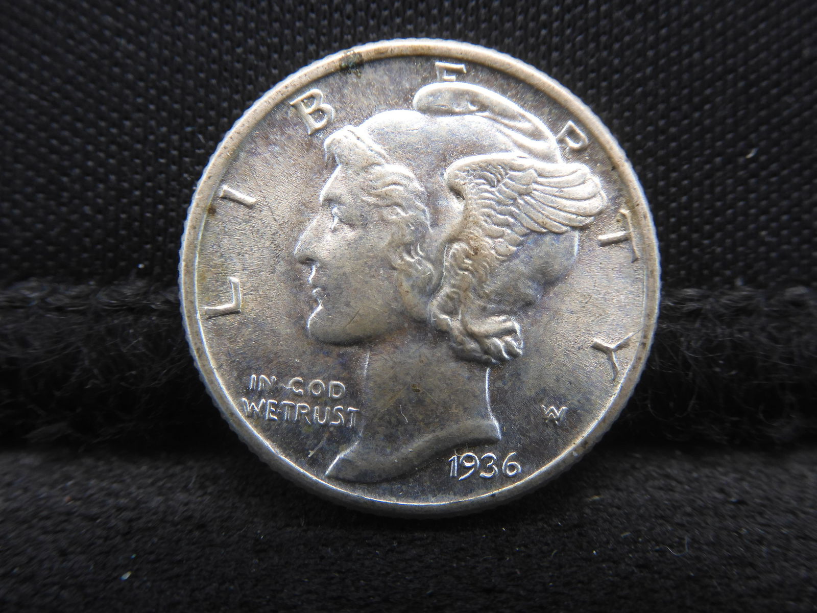 1936 Uncirculated Mercury Head Dime. (1 of 2)