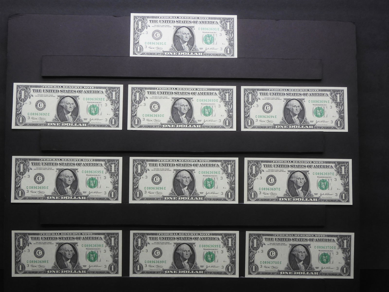 (10) 2003 $1 Federal Reserve Notes from Philadelphia district. Consecutive serial numbers in GEM (1 of 11)