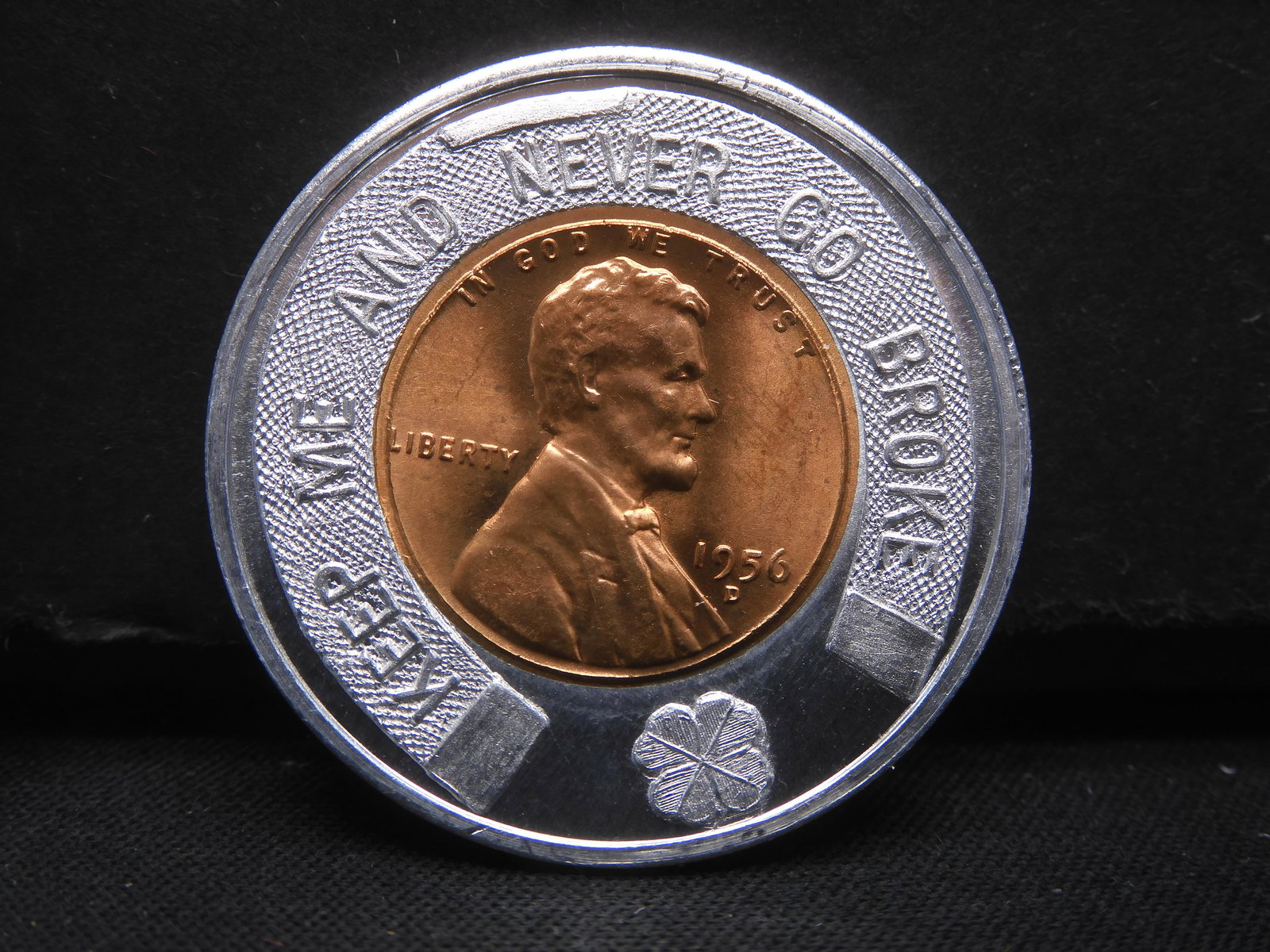 Encased Good Luck 1956-D Wheat cent.  Don Coe, Your Distributor.  Probable Ft Wayne IN area.  GEM (1 of 3)