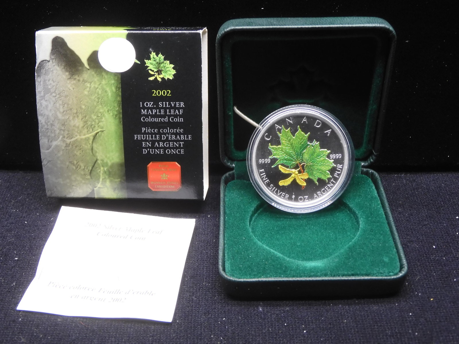 2002 $5 1 Ounce Colorized Canadian Maple Leaf .9999 Silver Less Than 30,000 Minted: 2002 $5 1 Ounce Colorized Canadian Maple Leaf .9999 Silver Less Than 30,000 Minted