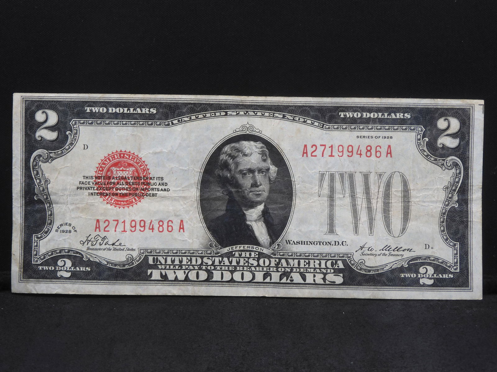 1928 $2 Red Seal Note.  VF Scarce with wholesale at $28 (1 of 3)