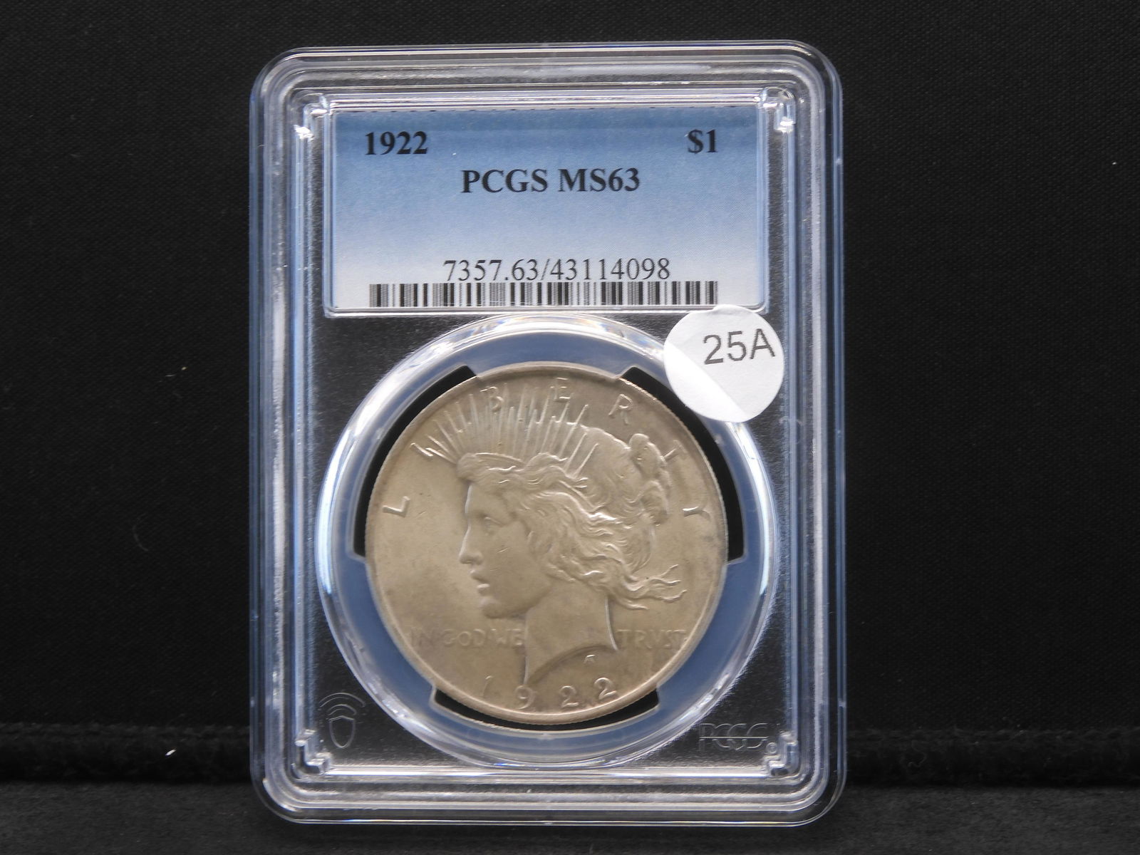 1922 Peace $1.  Slabbed by PCGS (Top tier grader) as MS 63.  Nice white coin with brilliant luster.. (1 of 3)