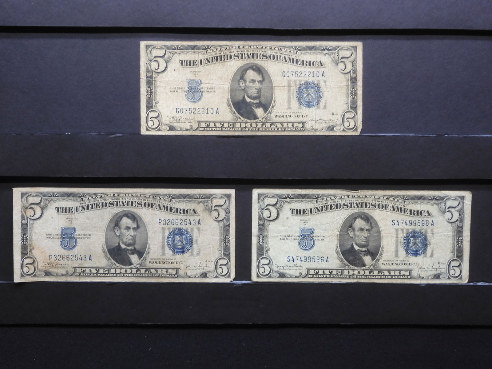 (3) Series 1934 $5 silver certificates:  34 A. 34 C and 34D.  Fine to VF. (1 of 6)