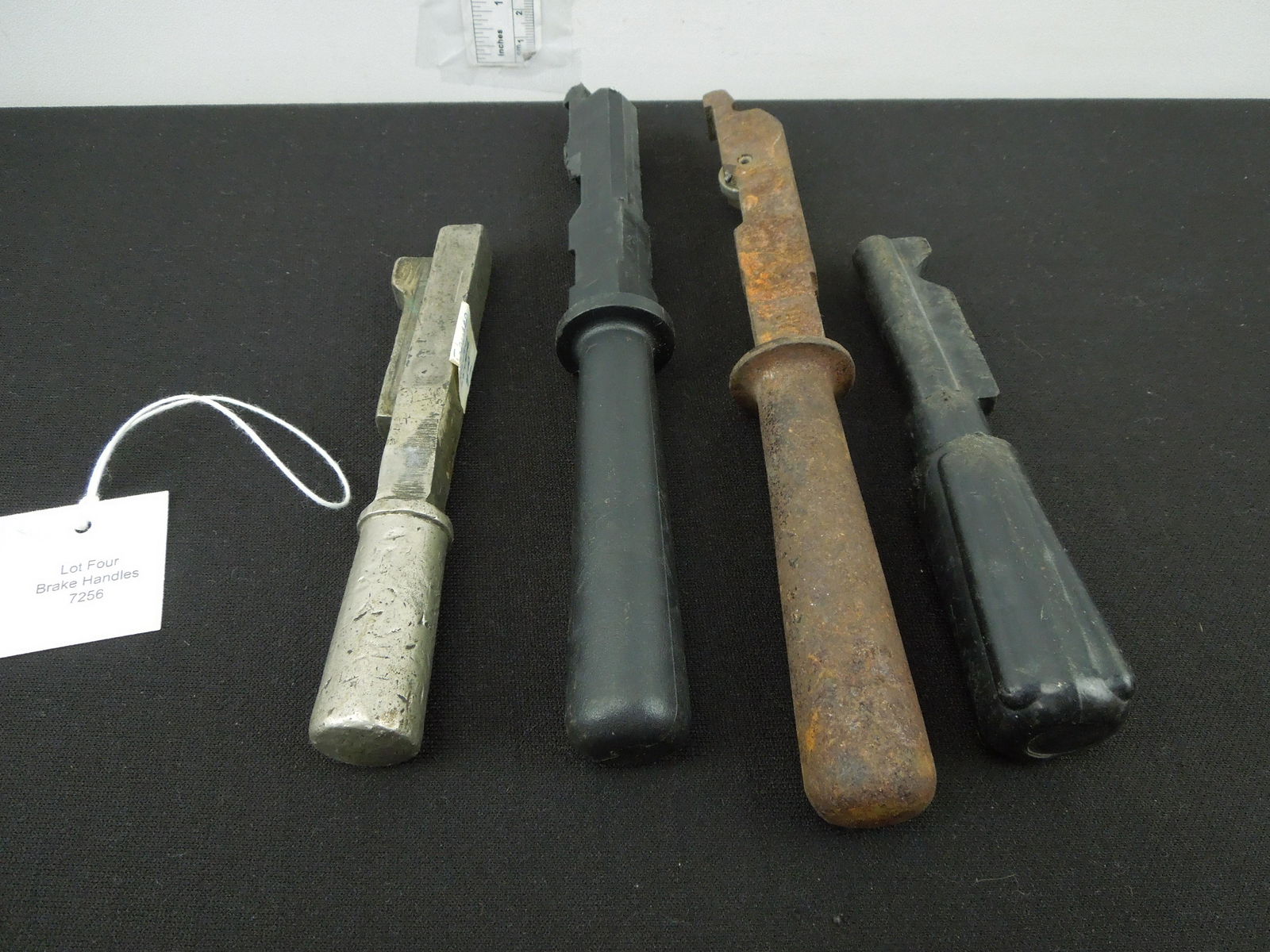 Locomotive Handles Lot of Four Handles - old style reverser, brake valve handles, new style reverser (1 of 4)