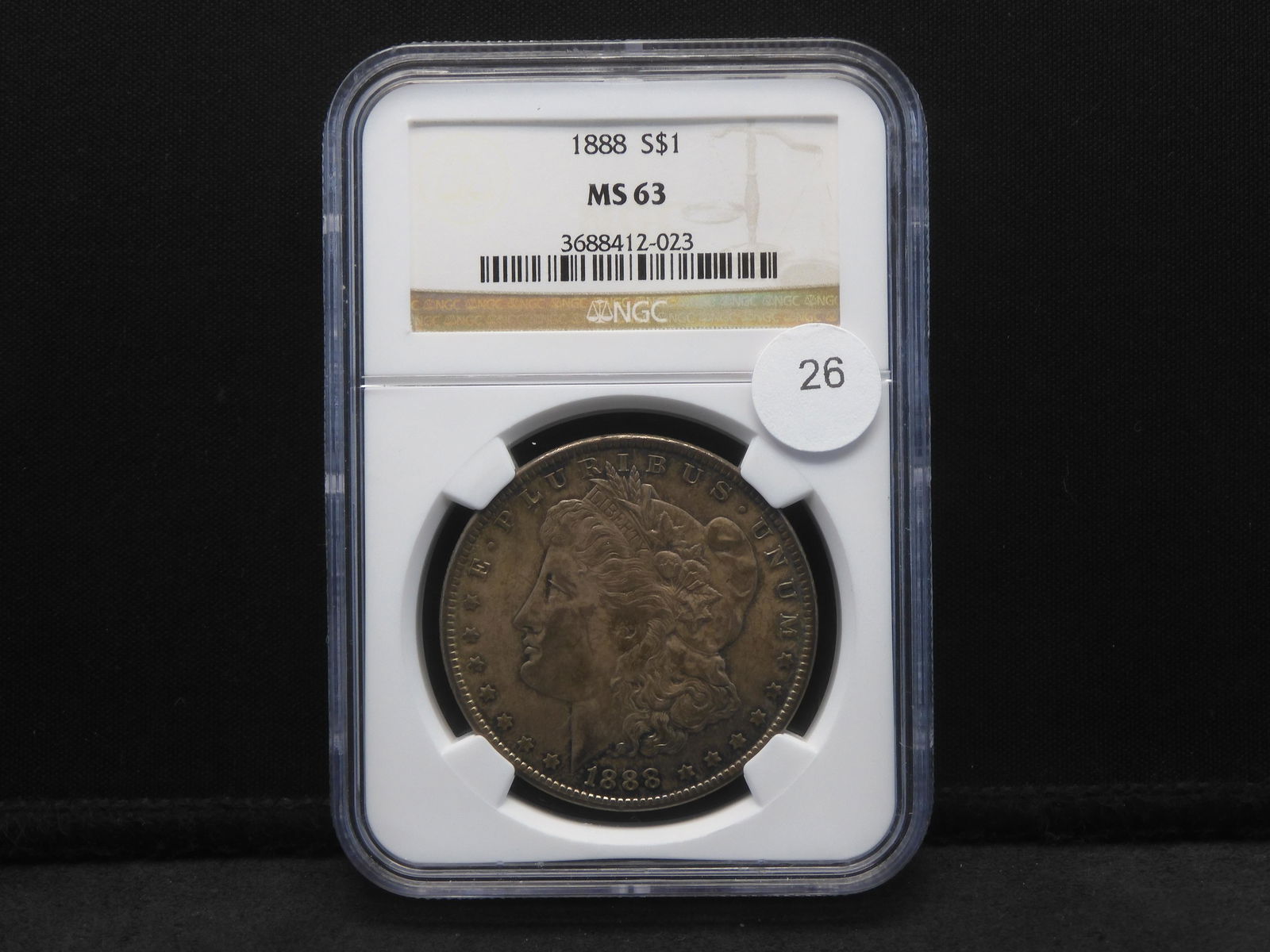 1888 Morgan Dollar.  Slabbed by NGC (Top grader) as MS 63. (1 of 4)