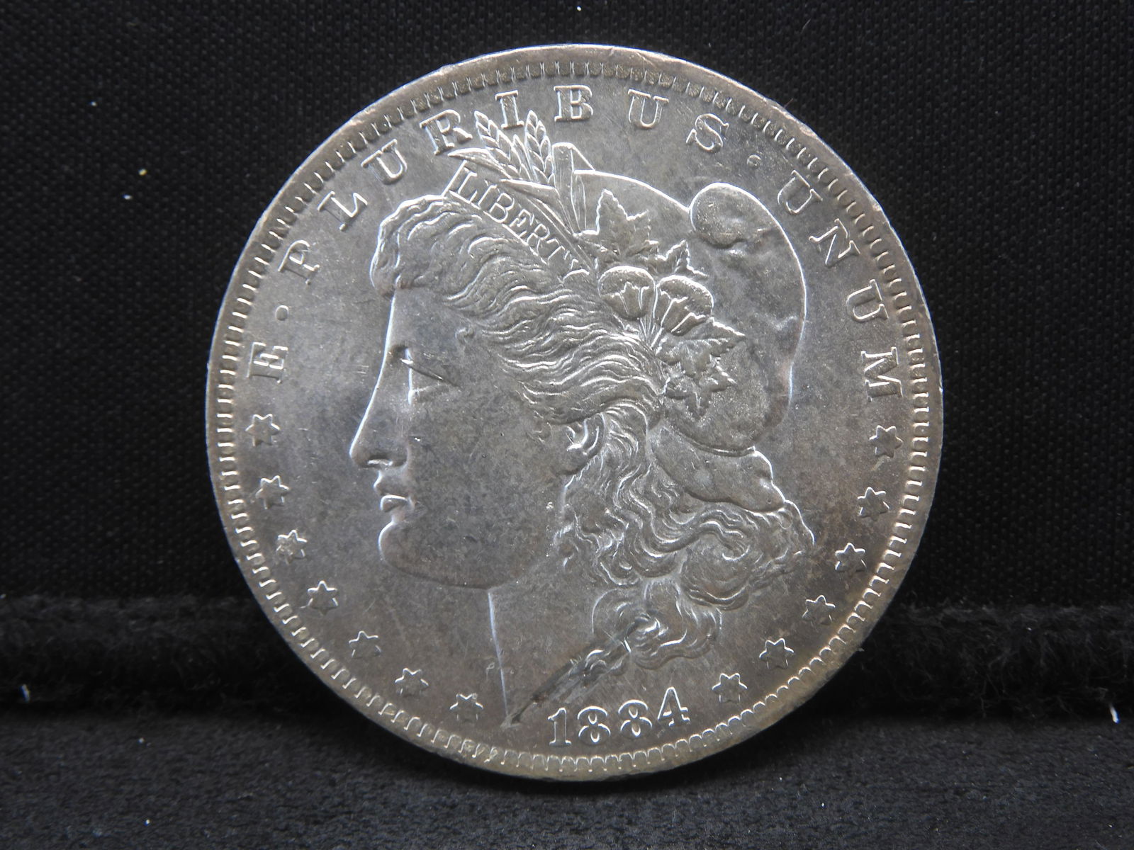 1884-O Morgan Silver Dollar - UNC (1 of 2)