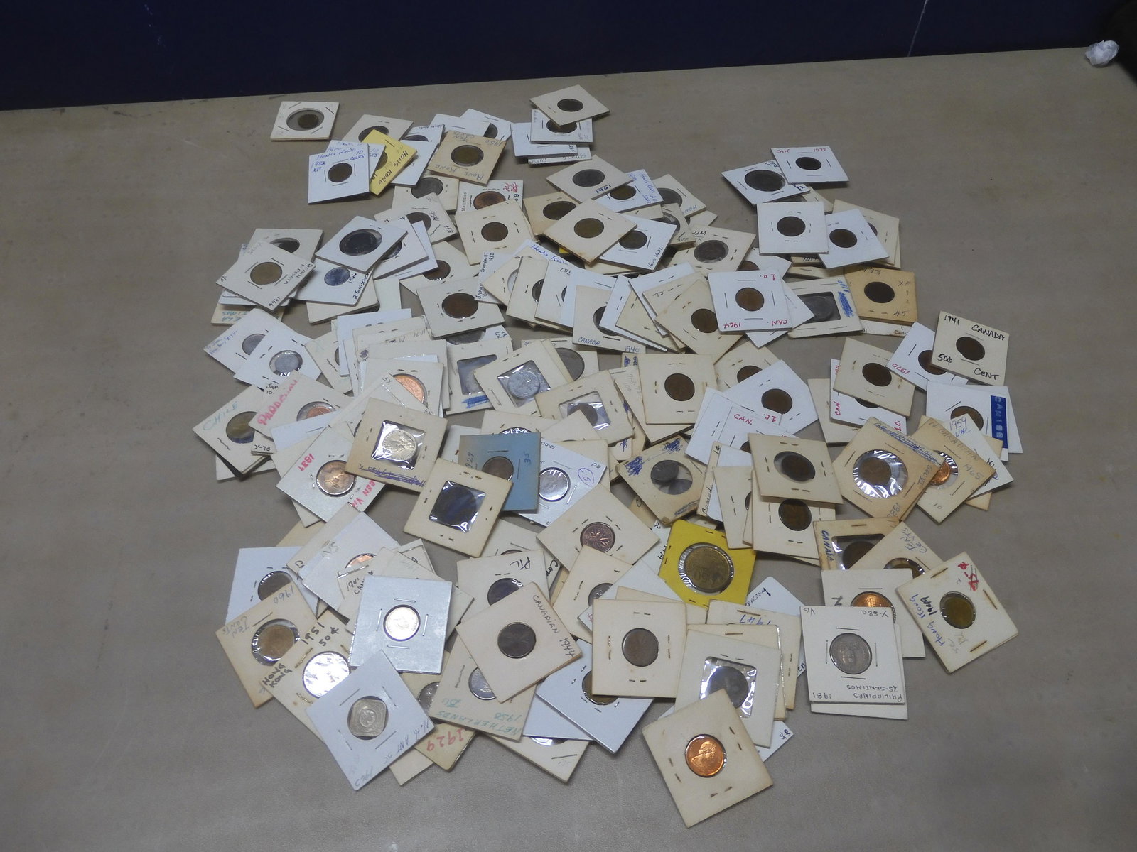 2.1 Pounds Foreign Coins In 2X2's. No Silver. Most Are Circulated. (1 of 10)