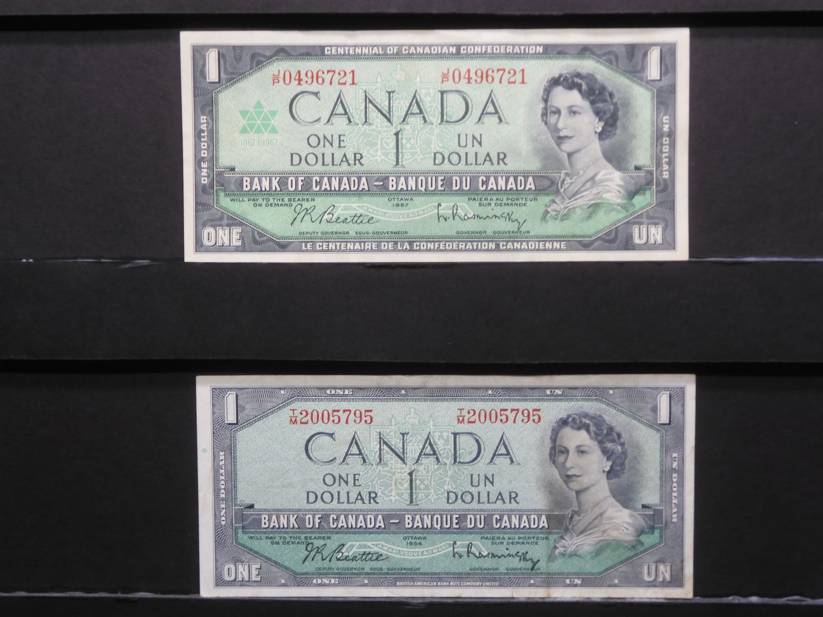 Canada $1 Notes, 1954 and 1967. Nice circulated.  (1 of 5)