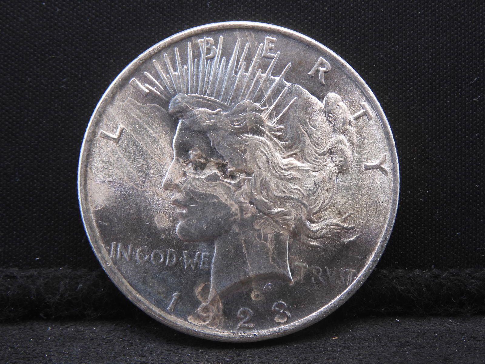 RARE Mint Through Error - 1923 Peace Silver Dollar - Obverse Struck (1 of 2)