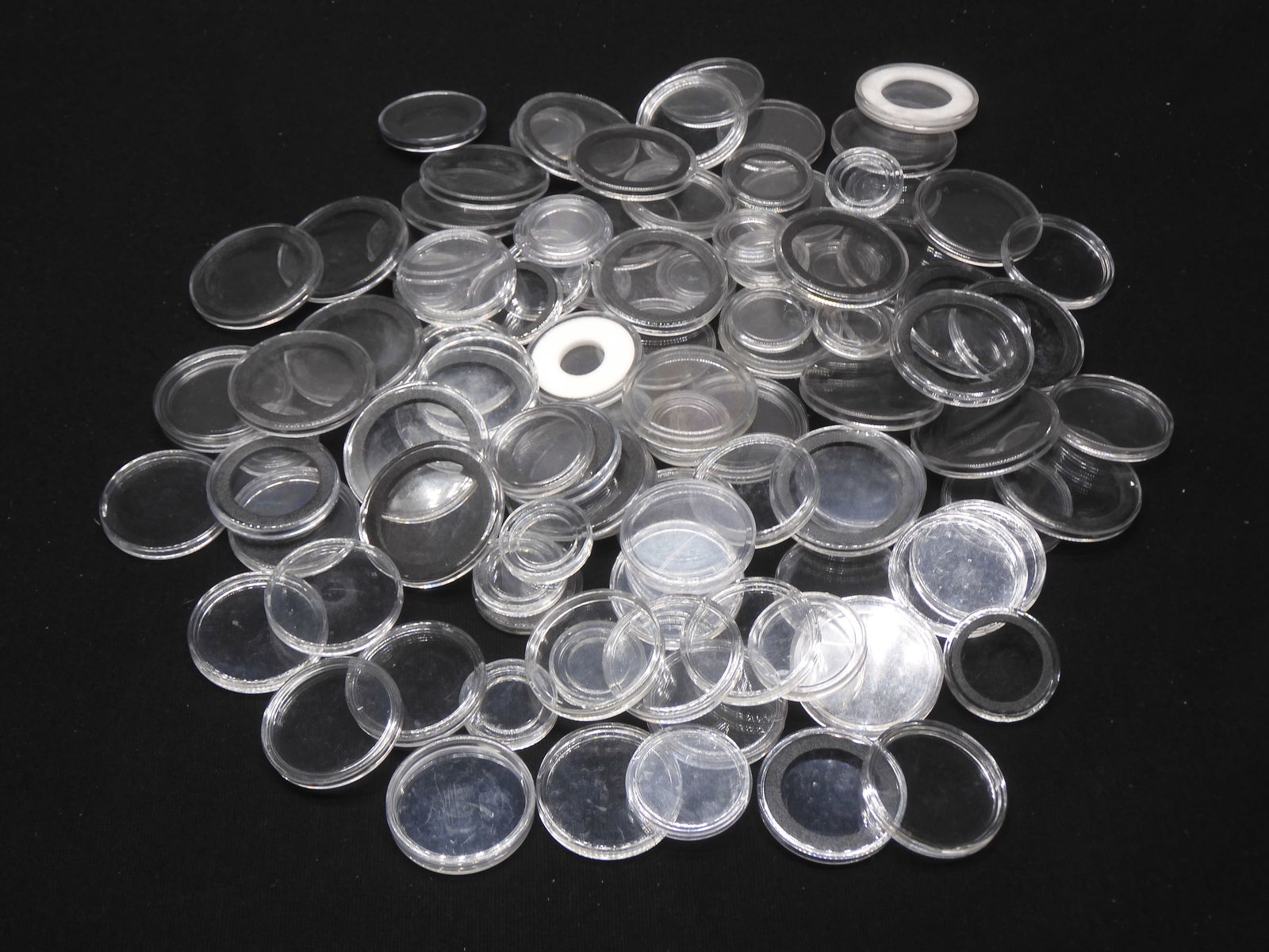 100 Coin Capsules Of Various Sizes And Denominations For Storing Your Coins. (1 of 5)