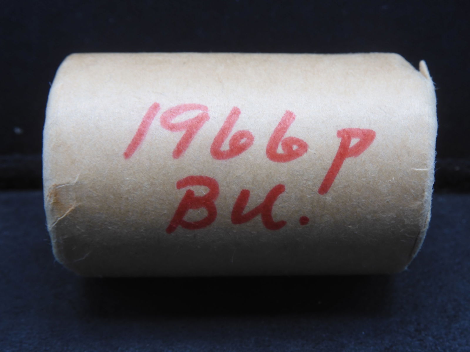 20-coin roll of 40% silver 1966 Kennedy Halves. Wrapped in 1966 by the Cleveland Federal Reserve. (1 of 3)