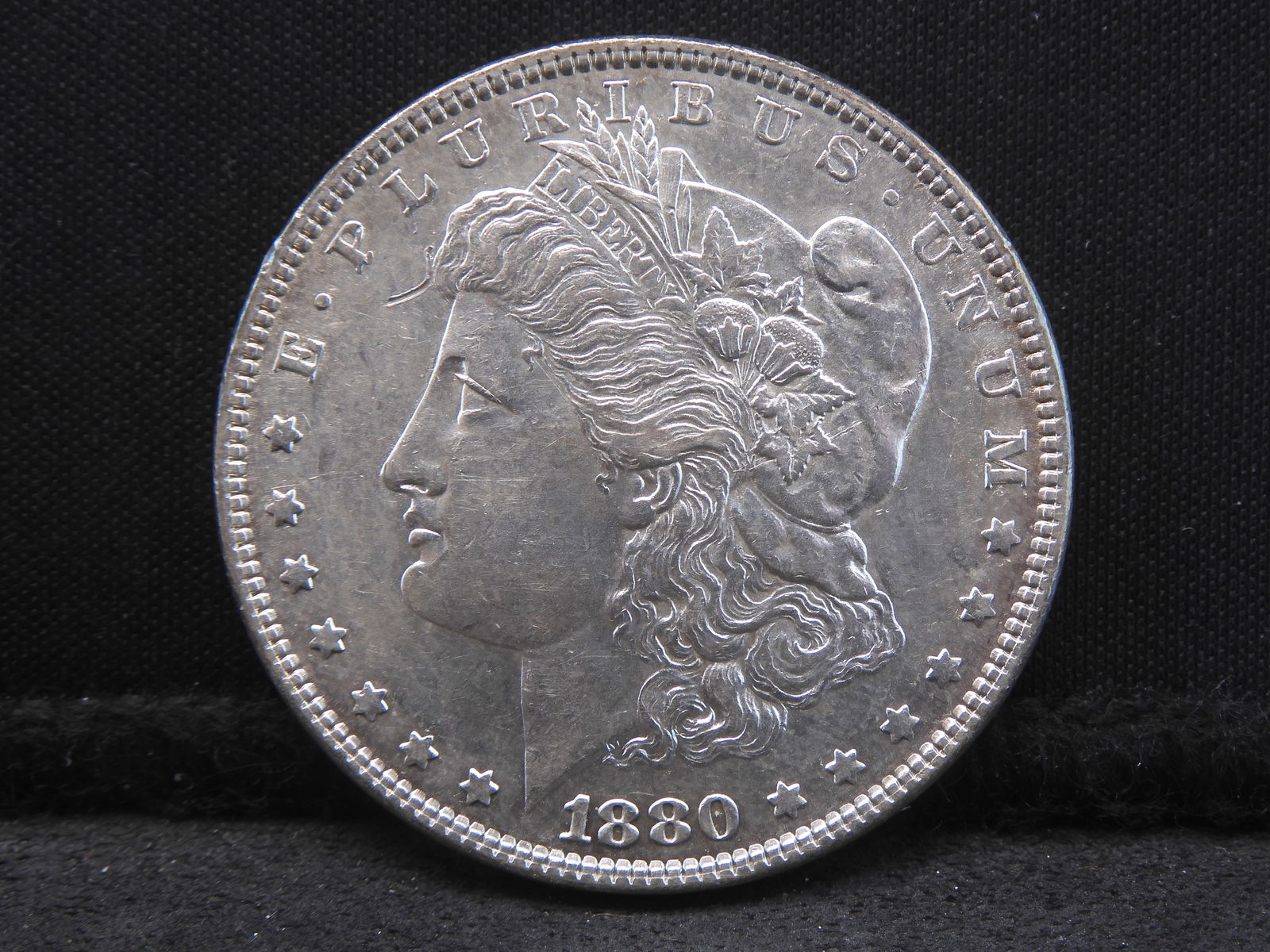 1880 Morgan $1. Better date. Nice luster (1 of 3)