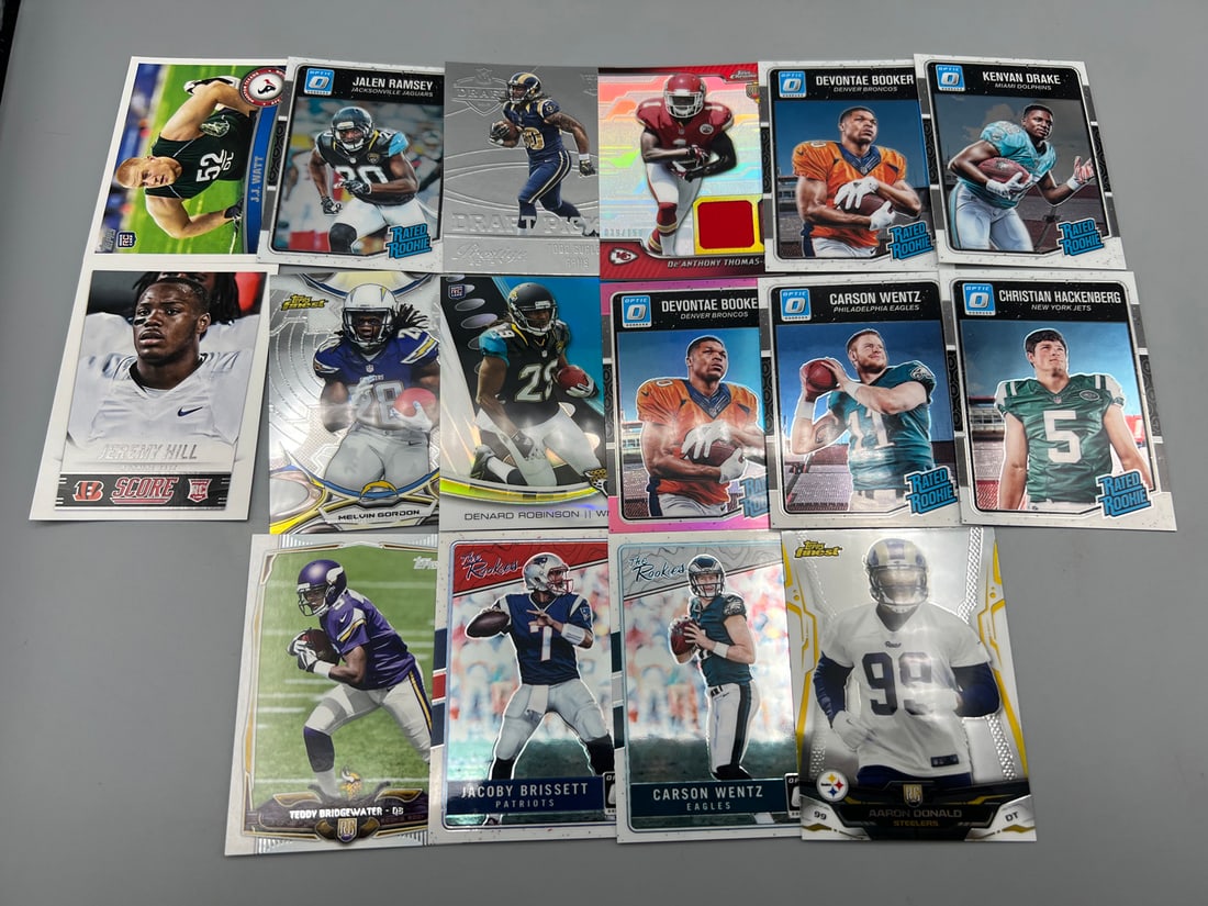 Lot of (16) Assorted Football RC Cards W/ Many Stars - Aaron Donald RC, J.J. Watt RC, Jalen Ramsey (1 of 5)