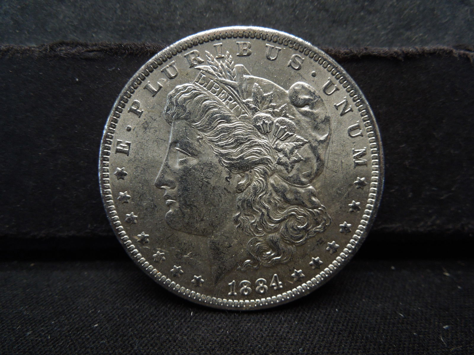 1884-O Morgan Silver Dollar  AU+ (1 of 2)