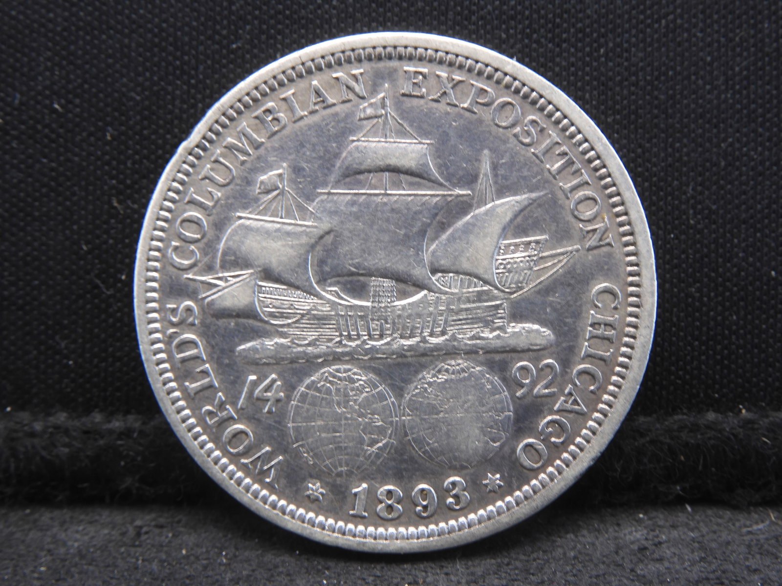 1893 Columbian Silver Half Dollar Commemorating The World Expo In Chicago & 400th Anniv. Of Columbus: 1893 Columbian Silver Half Dollar Commemorating The World Expo In Chicago & 400th Anniv. Of Columbus Discovering America. REV: Christopher Columbus. OBV: Santa Maria.