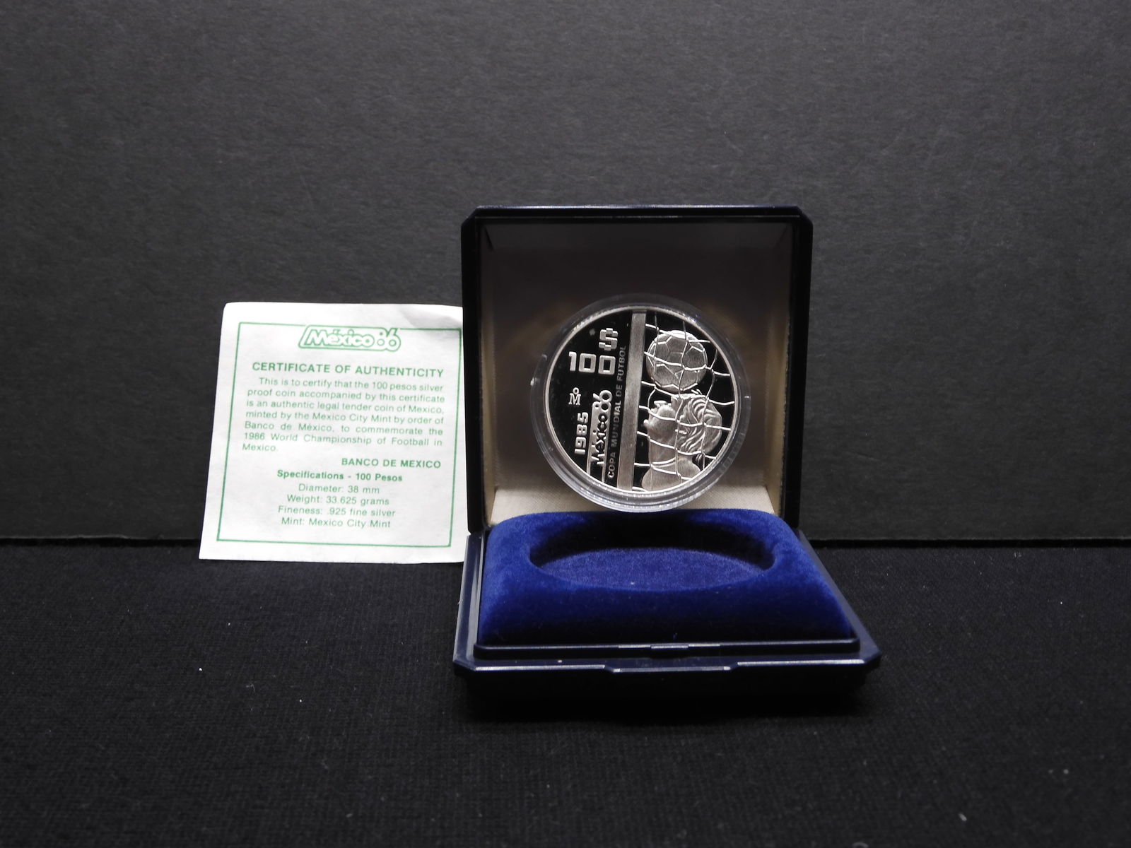 1985 Mexico .925 silver 100 Pesos issued to commemorate the 1986 World Cup.  GEM Proof in original (1 of 4)