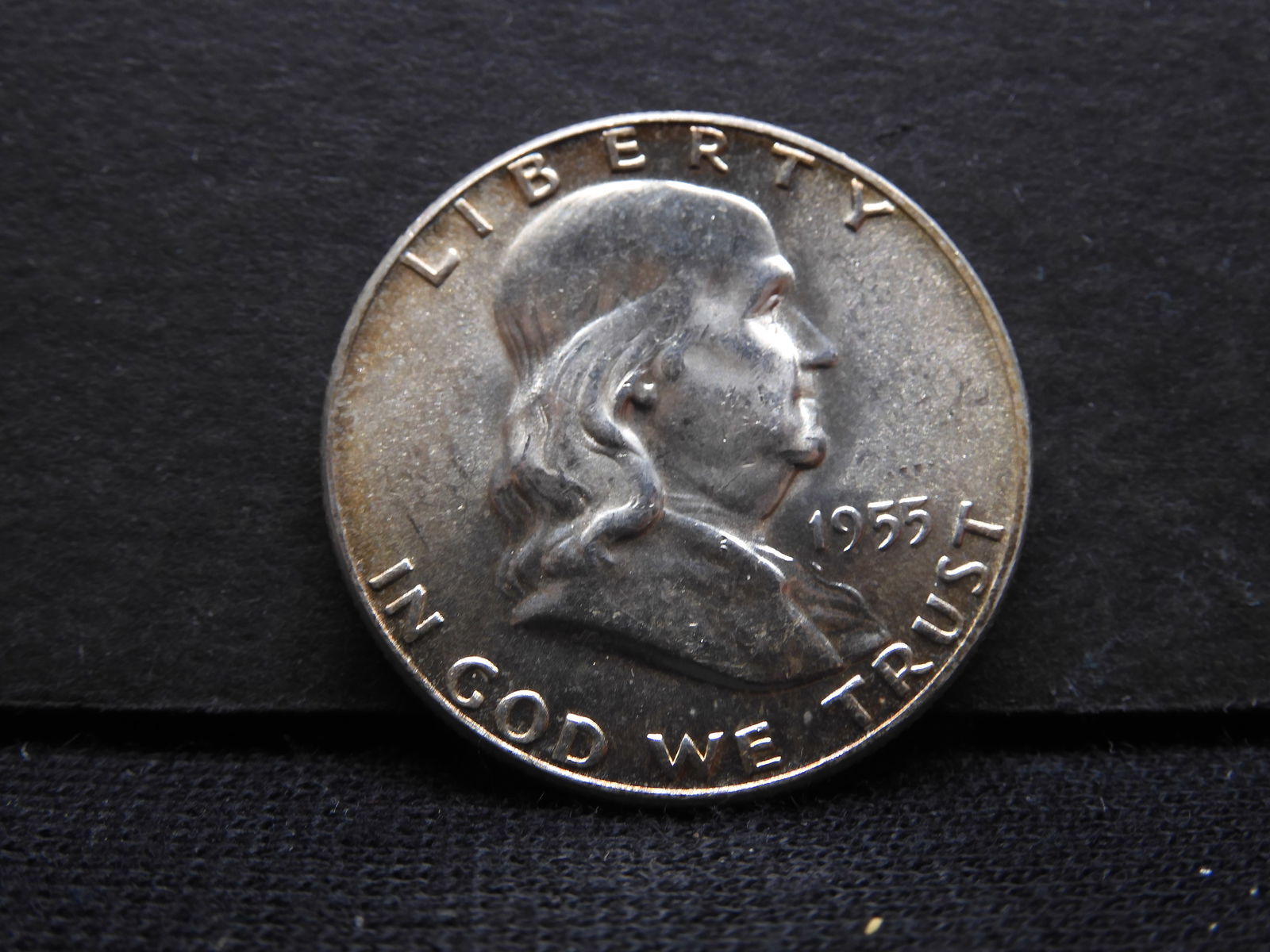 1955 Brilliant Uncirculated Benjamin Franklin Half Dollar.  REV: Liberty Bell. (1 of 2)
