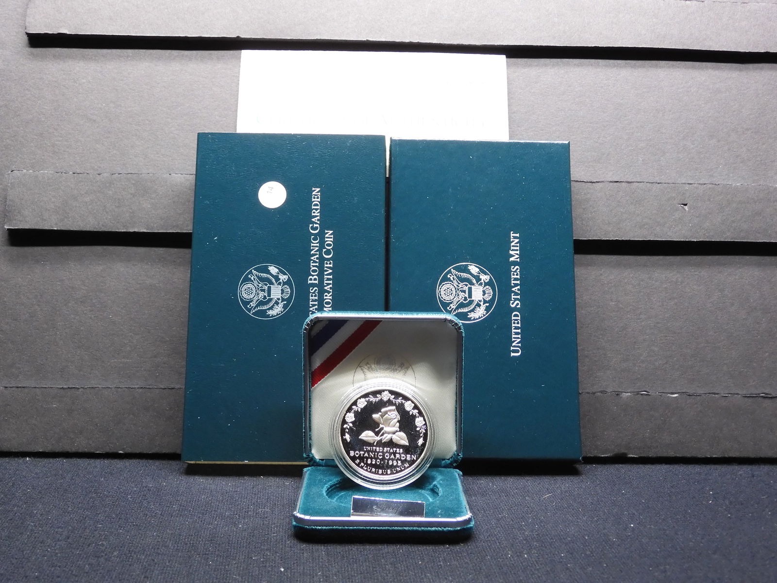 1997 P Botanic Gardens commemorative $1 in Mint box with COA.  GEM proof. (1 of 4)