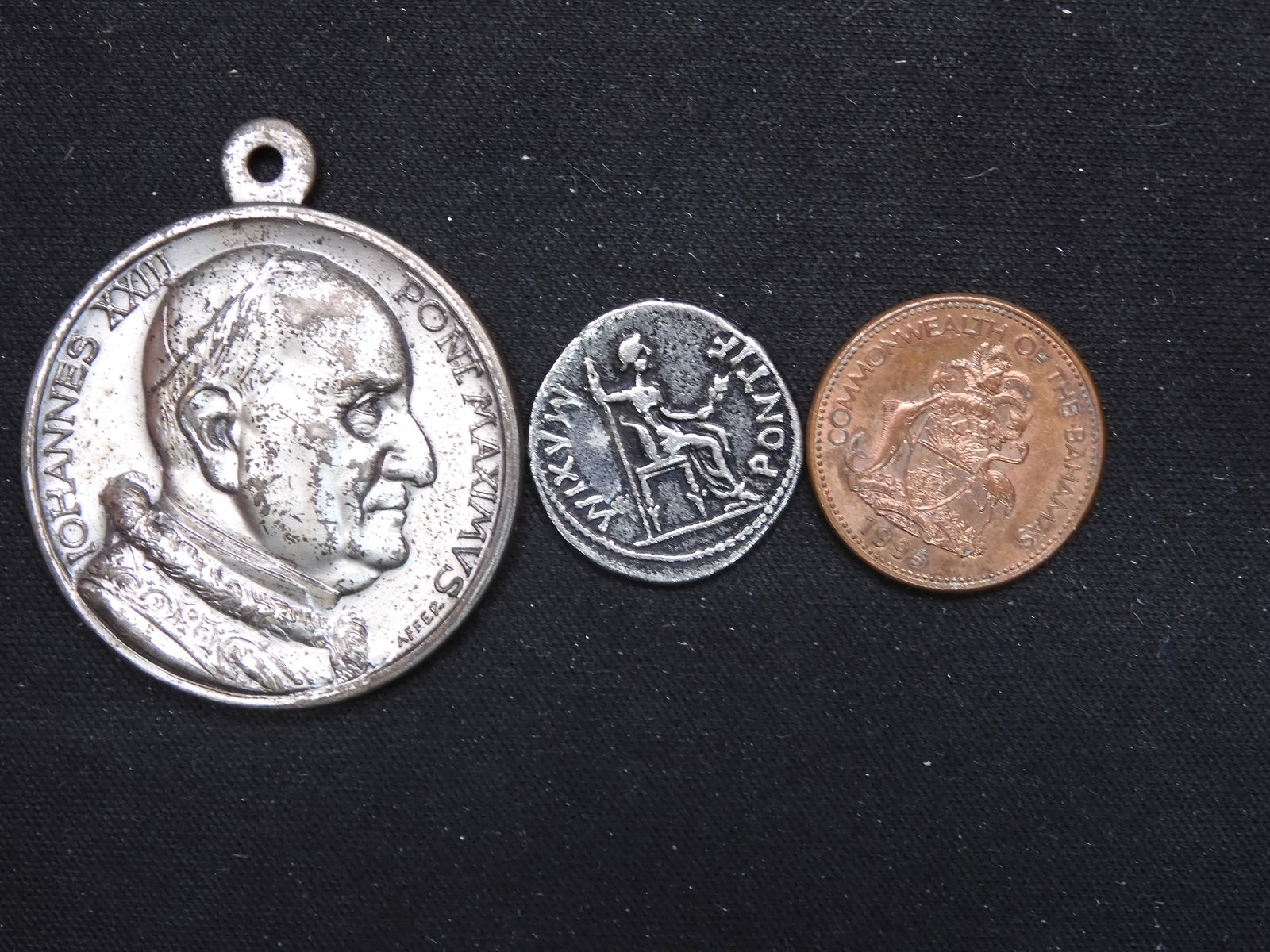 Three Misc. Coins and Tokens (1 of 3)
