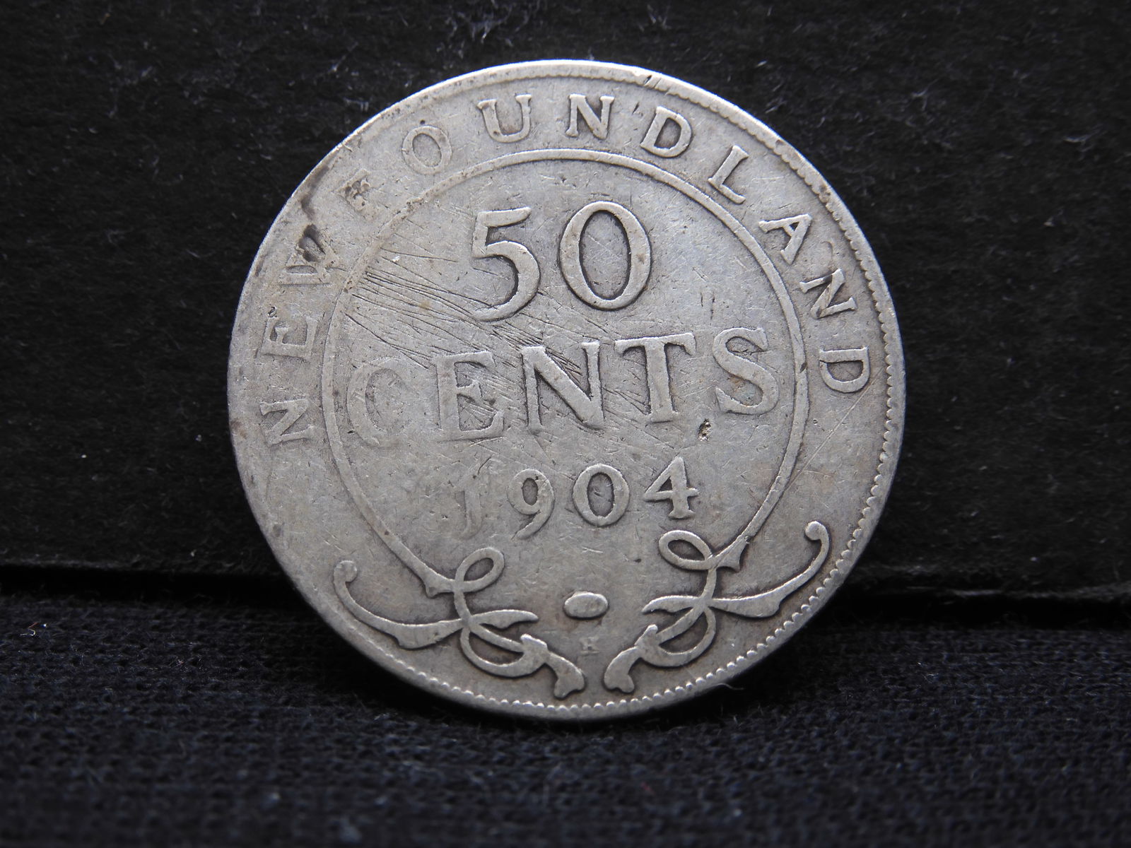 1904-H Newfoundland 92.5% Silver Half Dollar. Original VG. (1 of 3)