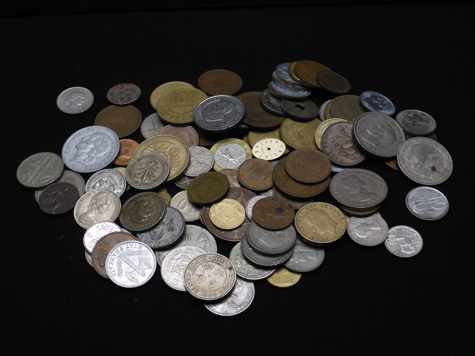 One pound plus of unsearched foreign coins.  Nice older mix. (1 of 5)