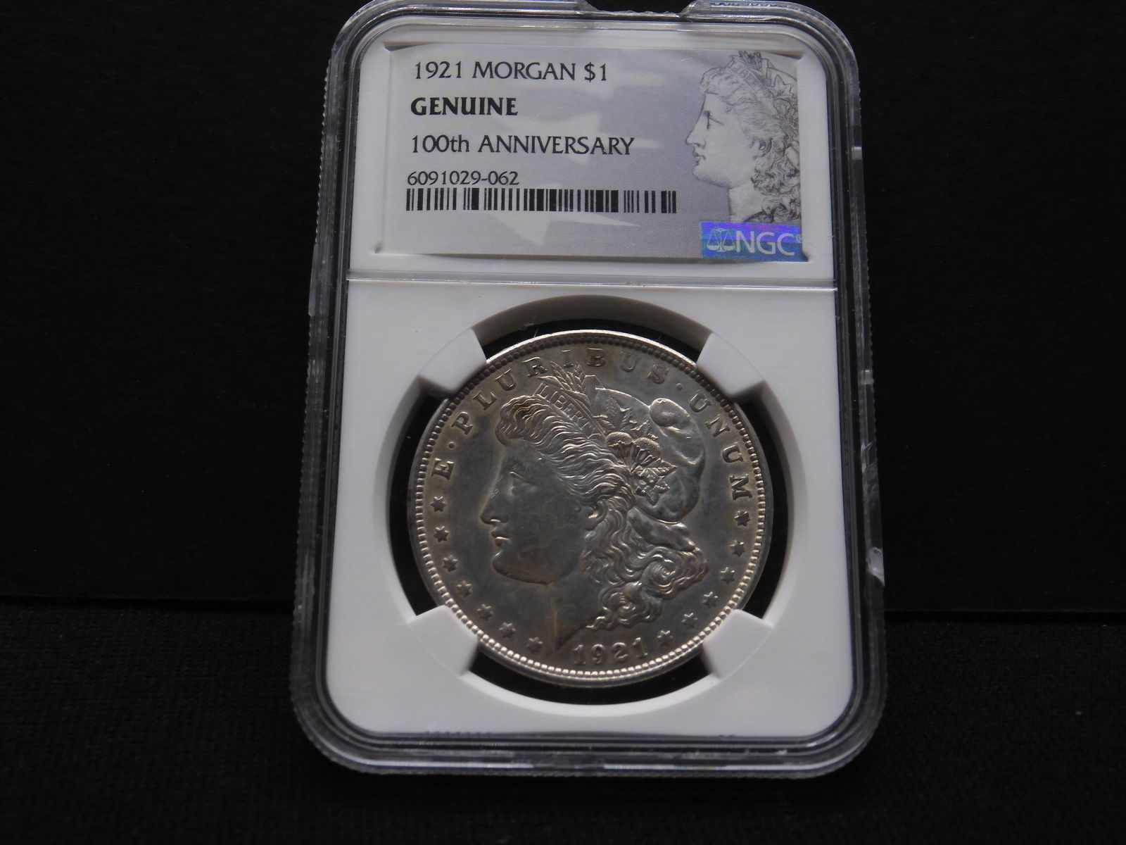 1921 Morgan Dollar - NGC Genuine 100th Anniv. (1 of 4)
