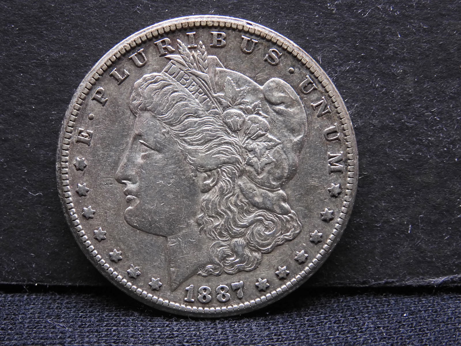 1887-S Morgan $1.  AU detail.  Tough date. (1 of 3)