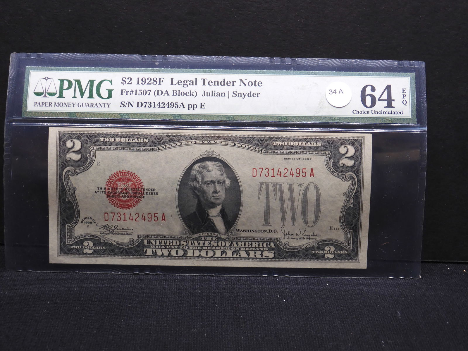 1928 F $2 Legal Tender Red Seal $2 Note.  Certified by PMG, Top Tier Grader, as CU 64, with (1 of 4)