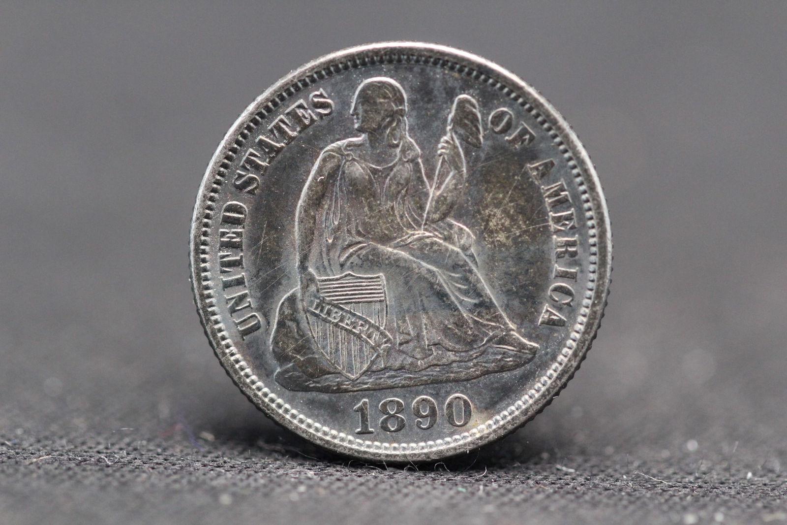 1890 Seated Dime. Nice toning and choice AU. (1 of 3)