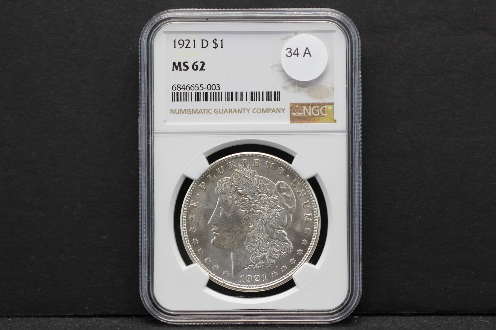 1921-D Morgan $1. Slabbed by NGC, top tier grader, as MS 62. Really difficult coin to find and nice.: 1921-D Morgan $1. Slabbed by NGC, top tier grader, as MS 62. Really difficult coin to find and nice. Should be a 63.