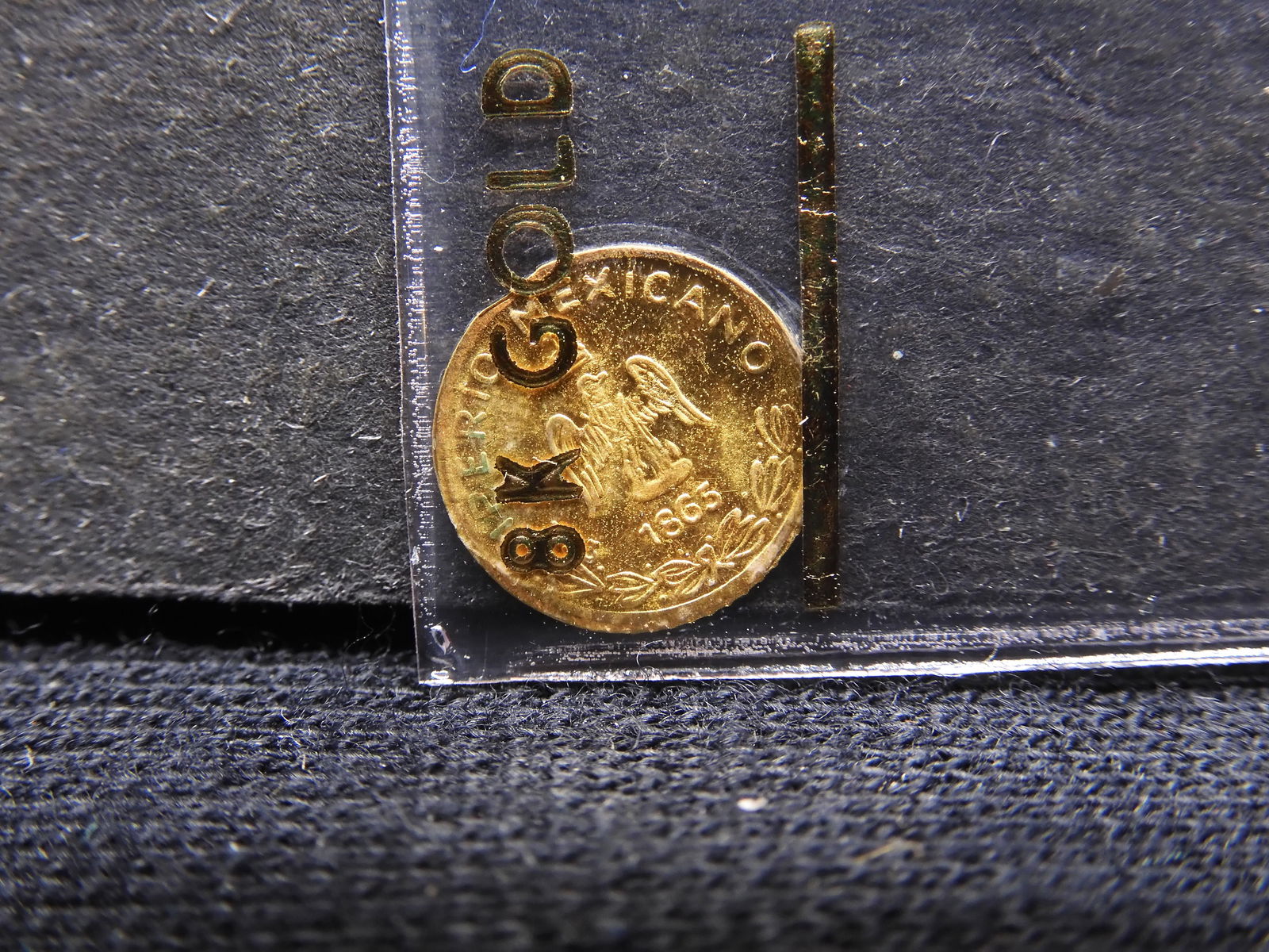 GOLD - 8 KT Mini Maximilian Round (1 of 2)