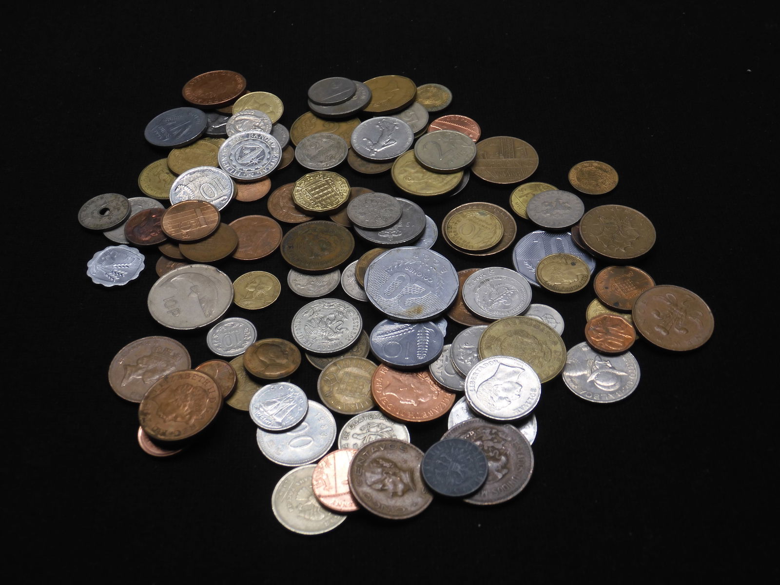 One pound plus of unsearched foreign coins.  Nice older mix. (1 of 6)