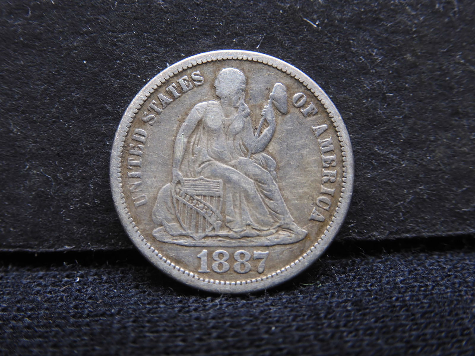 1887 Seated Dime. VF. Original. (1 of 3)