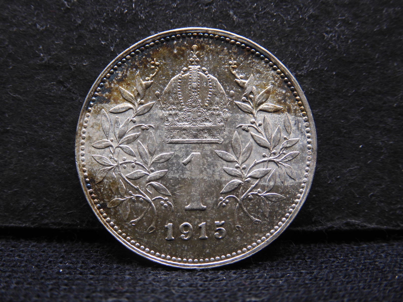 1915 Austria Brilliant Uncirculated One Corona. Franz Joseph I Portrait.: 1915 Austria Brilliant Uncirculated One Corona. Franz Joseph I Portrait.