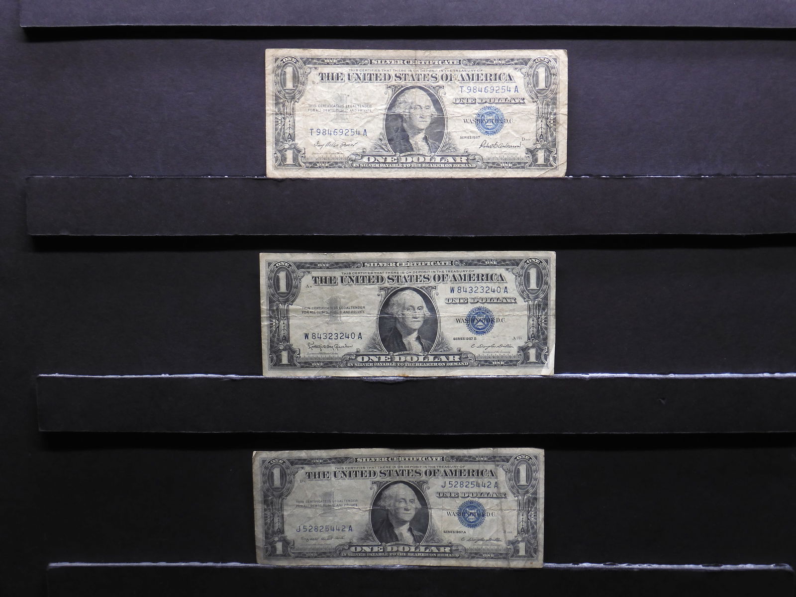 1957 1957-A 1957-B $1 Blue Seal Silver Certificates.  Portrait Of George Washington. (1 of 3)