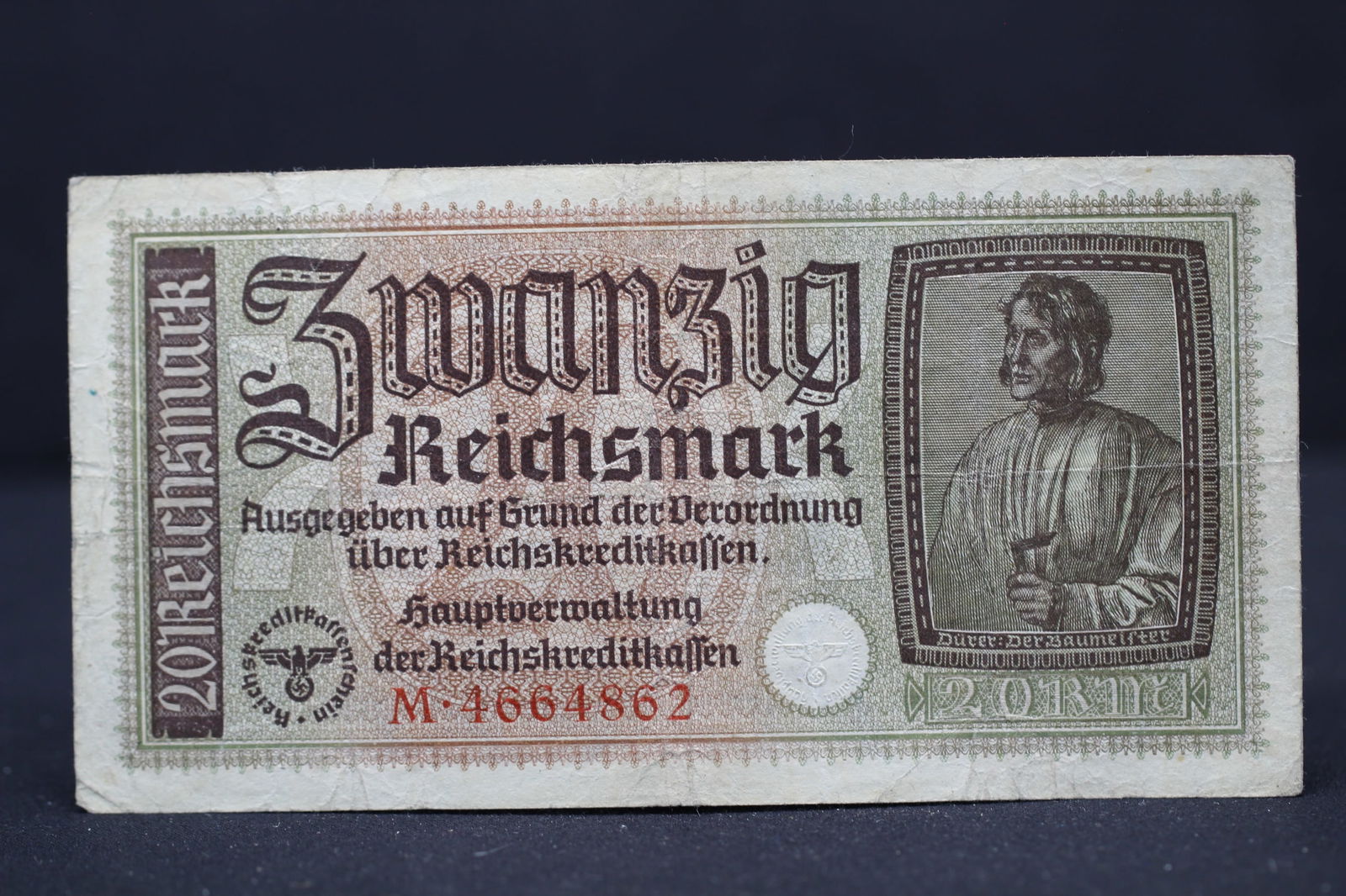 WWII German occupation 20 Reichsmark. Embossed with historical symbol (1 of 2)