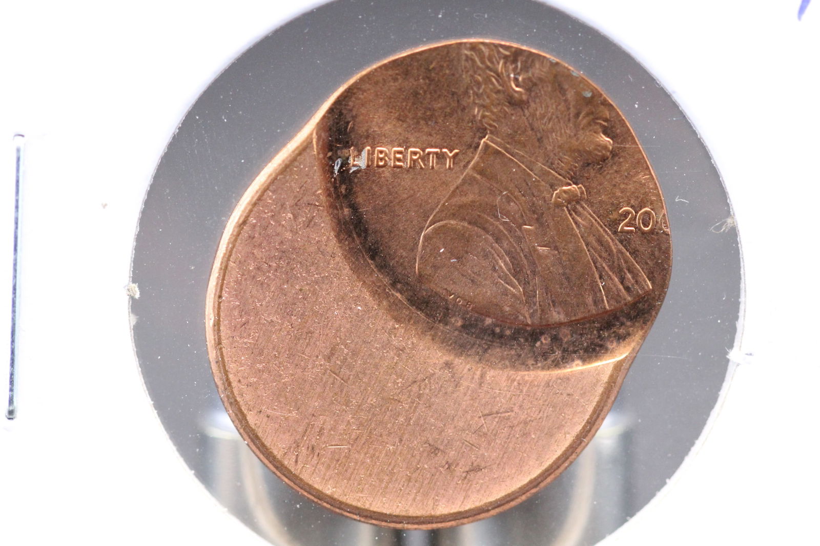 200X Off Center Lincoln Cent. UNC. (1 of 3)