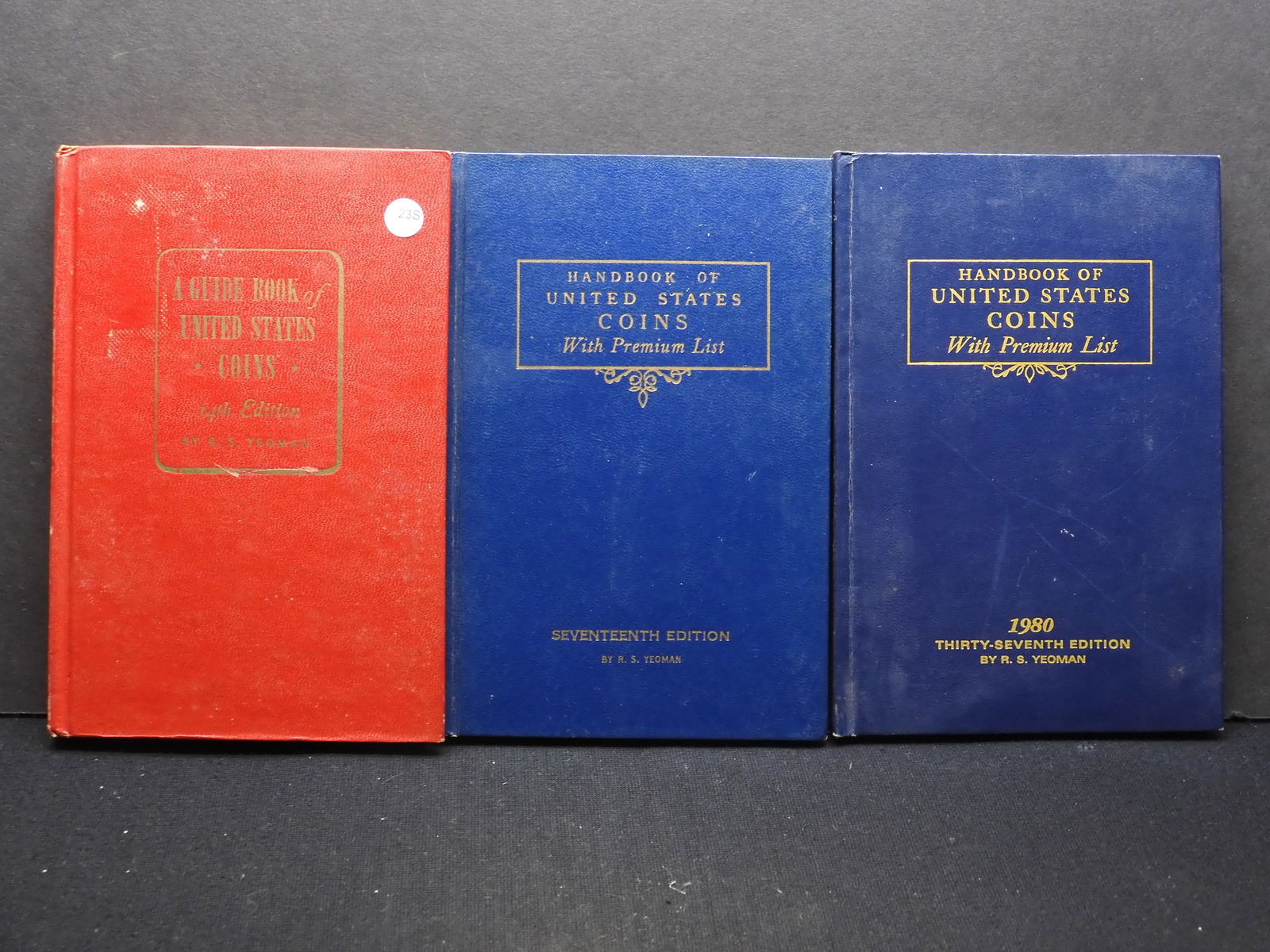 3 Coin Guide Books (1 of 4)
