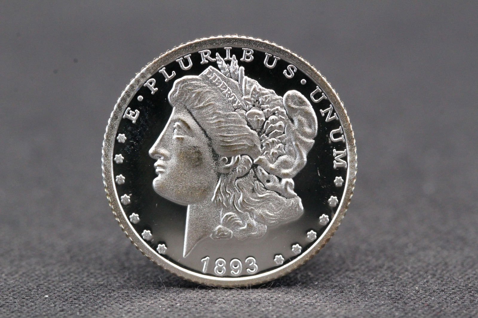 1893 1/10 Troy Ounce .999 Fine Silver Morgan Dollar Round (1 of 2)