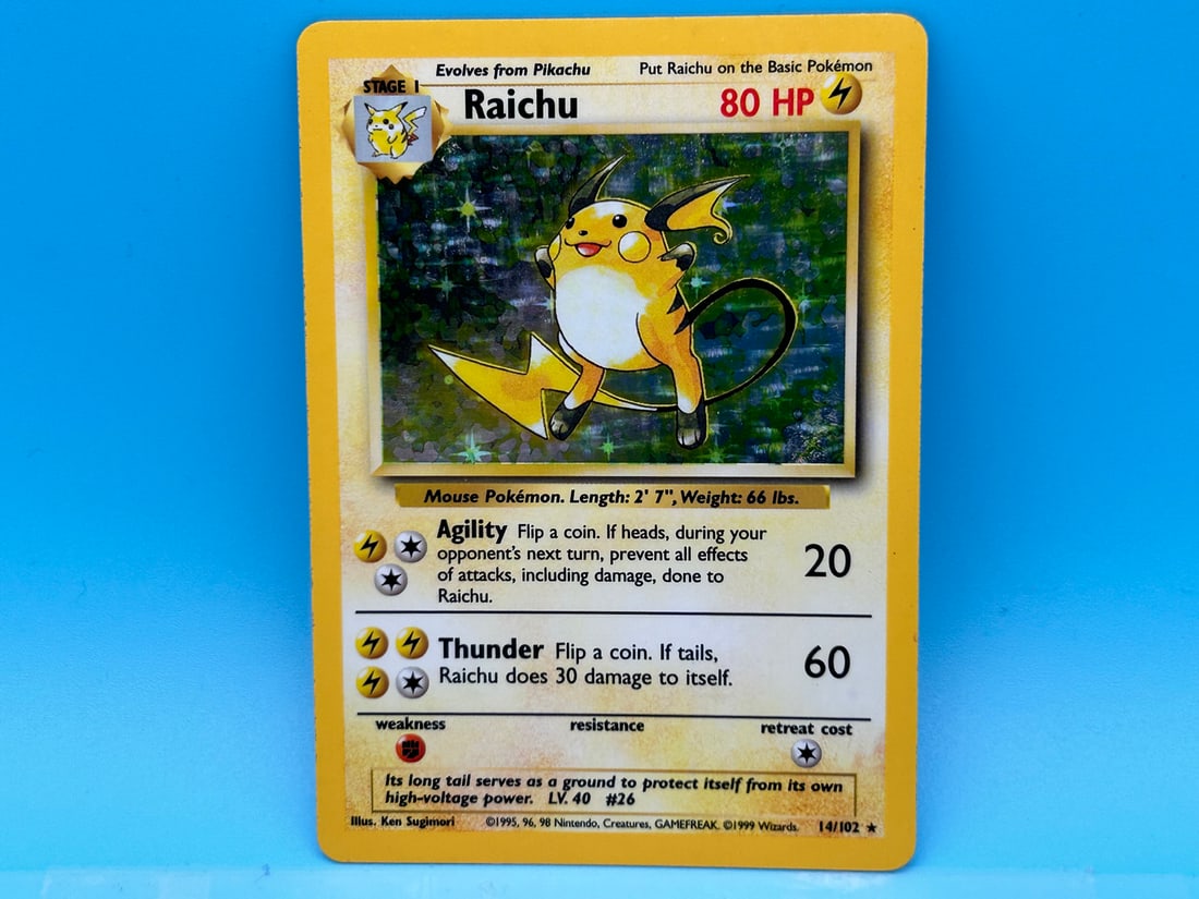 1999 Pokemon Base Set Unlimited Raichu Foil #14/102: 1999 Pokemon Base Set Unlimited Raichu Foil #14/102