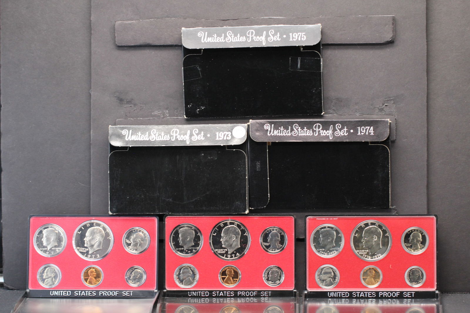 1973-S 1974-S 1975-S United States Proof Sets With Original Gov't Packaging. 18 Coins.: 1973-S 1974-S 1975-S United States Proof Sets With Original Gov't Packaging. 18 Coins.
