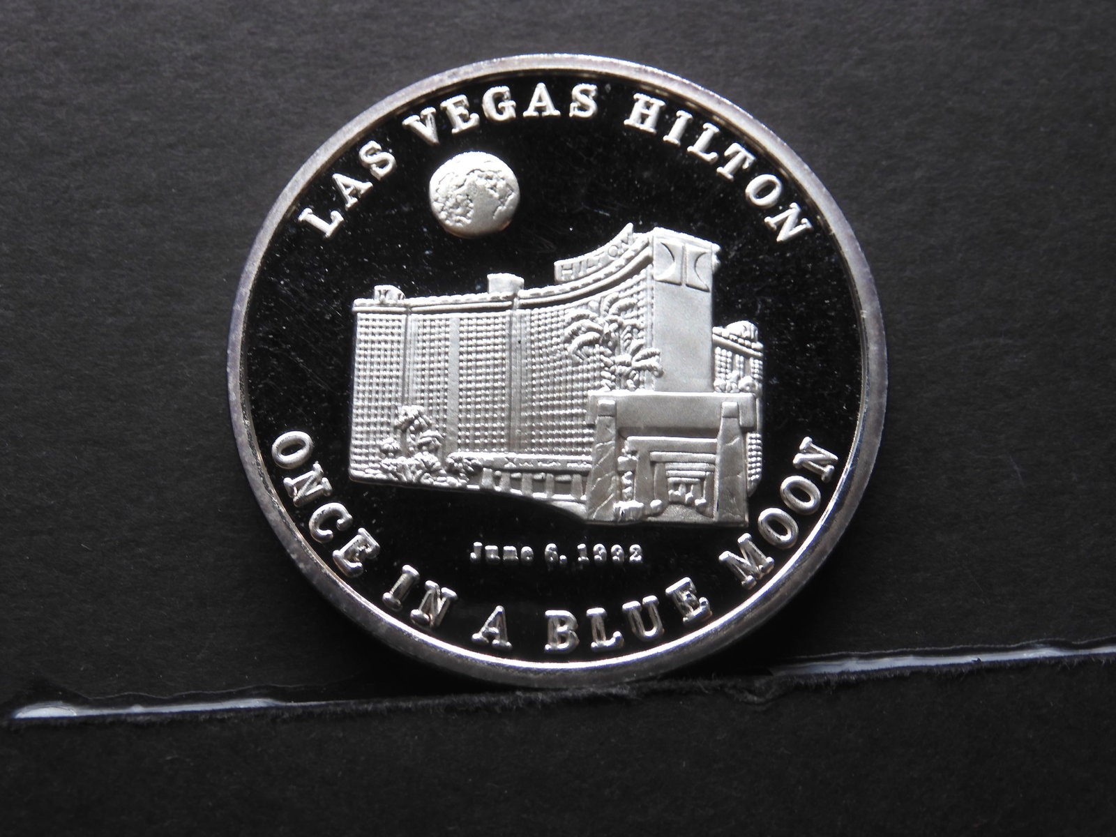 Once on a Blue Moon .999 art round from the Las Vegas Hilton celebration in 1992. Two troy ounces of: Once on a Blue Moon .999 art round from the Las Vegas Hilton celebration in 1992. Two troy ounces of silver. Neat!