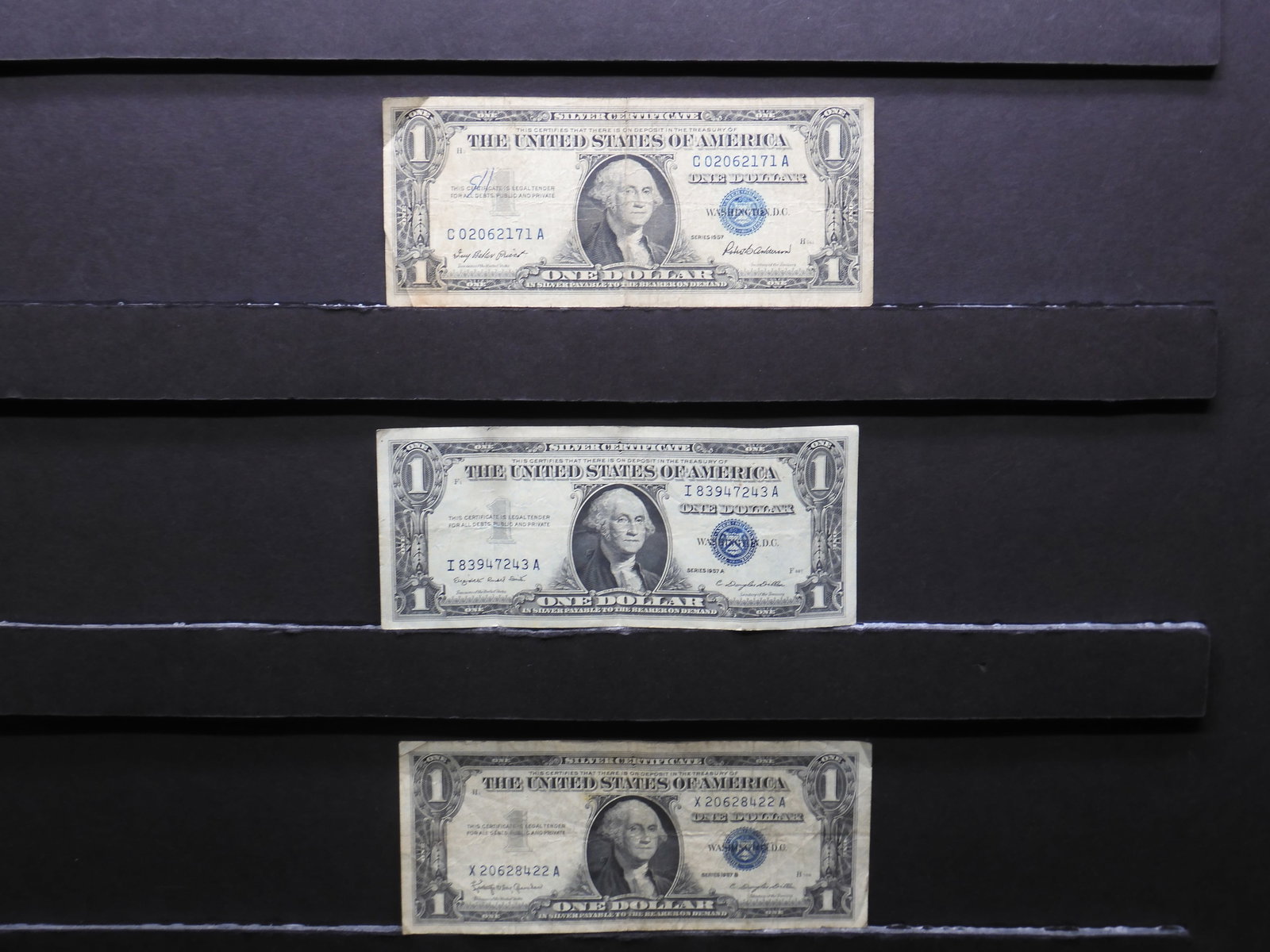 1957 1957-A 1957-B $1 Blue Seal Silver Certificates. Portrait Of George Washington.: 1957 1957-A 1957-B $1 Blue Seal Silver Certificates. Portrait Of George Washington.