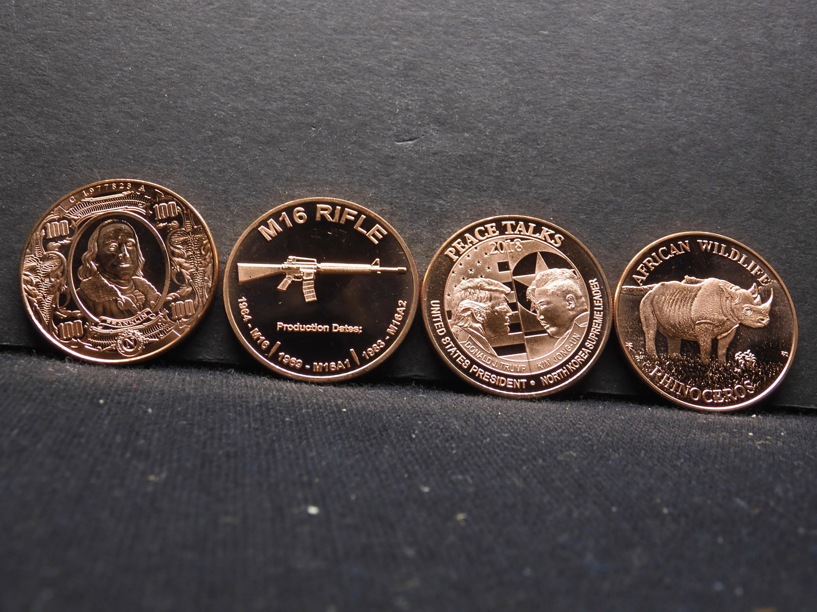 Four 1 Ounce .999 Fine Proof Copper Rounds Commemorating A Variety Of Themes: Rhinoceros, Peace: Four 1 Ounce .999 Fine Proof Copper Rounds Commemorating A Variety Of Themes: Rhinoceros, Peace Talks, Franklin, Rifle.