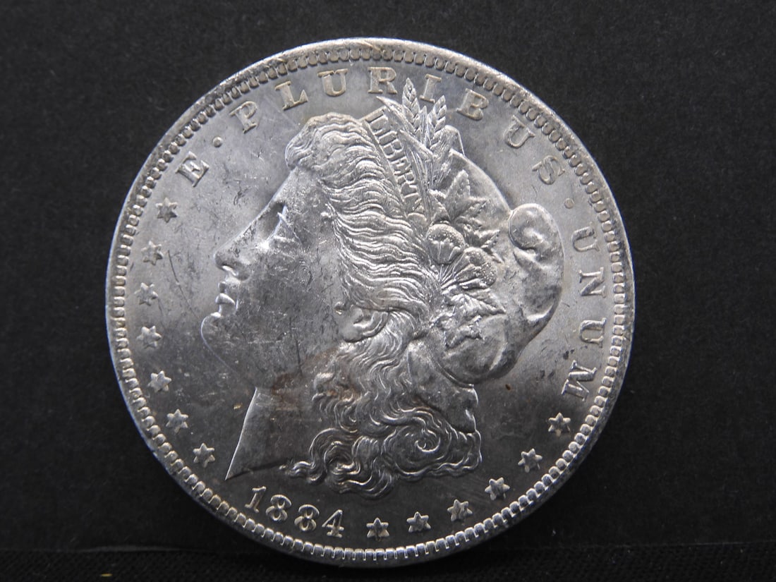 1884 O Morgan Silver Dollar - Uncirculated (1 of 2)